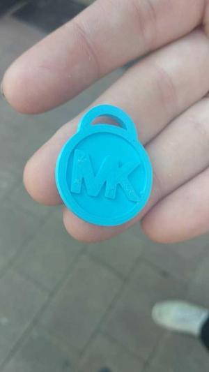 Michael Kors Keychain and coin of 50 c.€