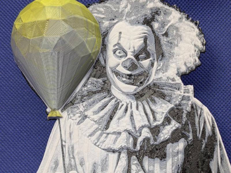 The sinister clown with the 3D balloon