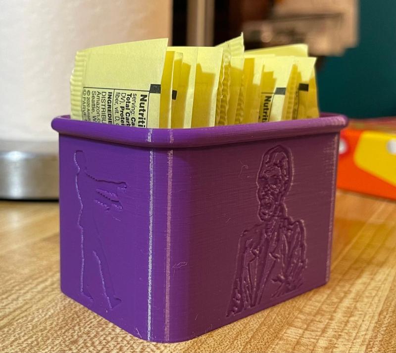 Spooky sugar packet holder