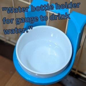 DRINKING BOWL HOLDER FOR GAUGE