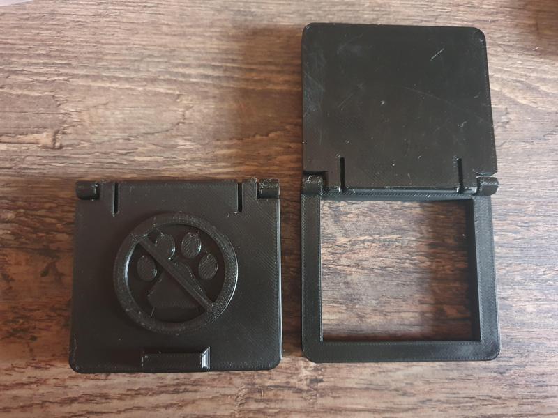 Button cover against cats