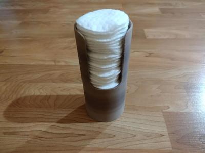 Elevated makeup pad holder