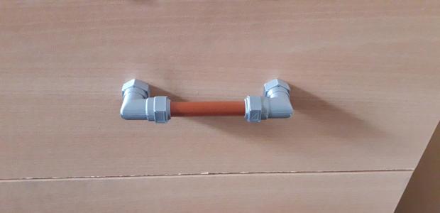 Pipe fitting handle.