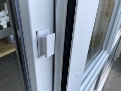 Low profile balcony door handle