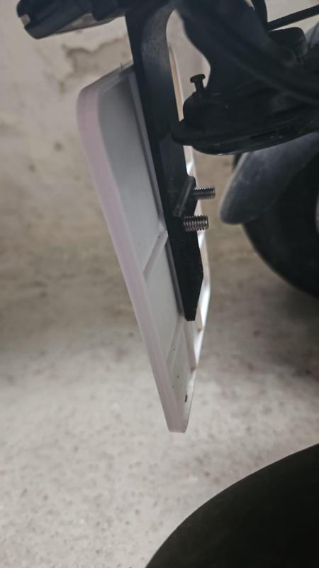 Numberplate holder for "Versicherungskennzeichen"