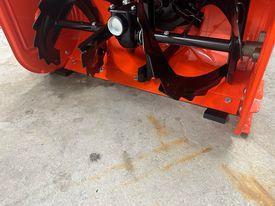 Snowblower adjustment block