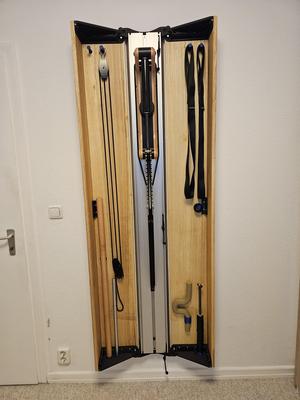 Custom door holder for the Eisenhorn training device including accessory holder