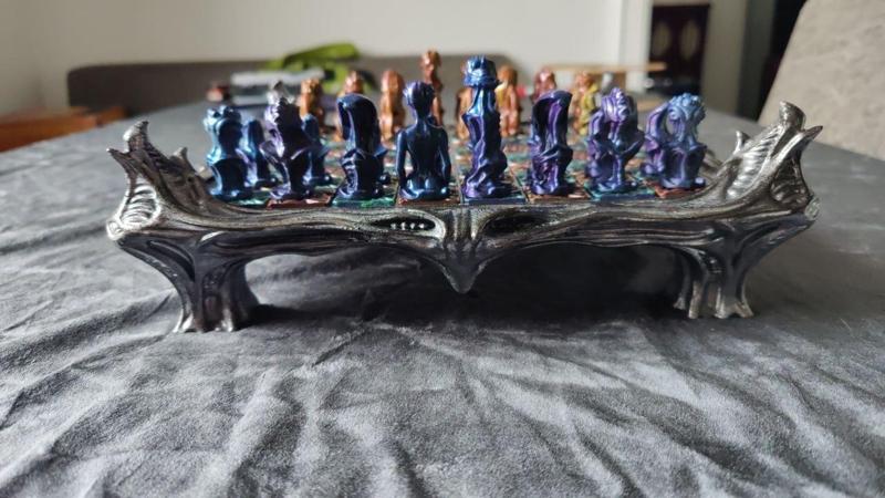 Biomechanical chessboard in H. R. Giger style - complete set with pieces
