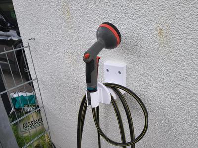 Wall Hose Bracket with Integrated Sprayer Holder 