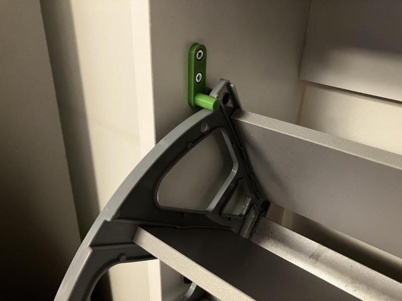 Stopper for a tilting shoe rack (Sconto).