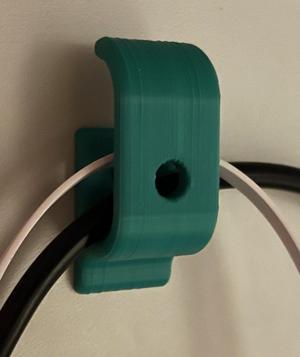 Wall cable holder