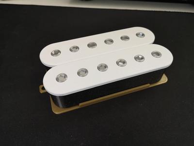Guitar humbucker style storage box