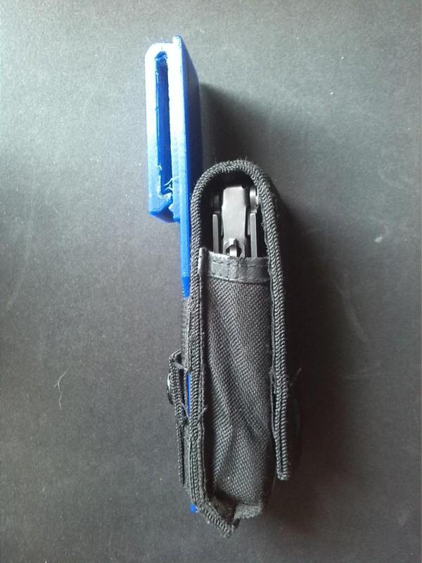 Leatherman OHT molle to belt clip adaptor.