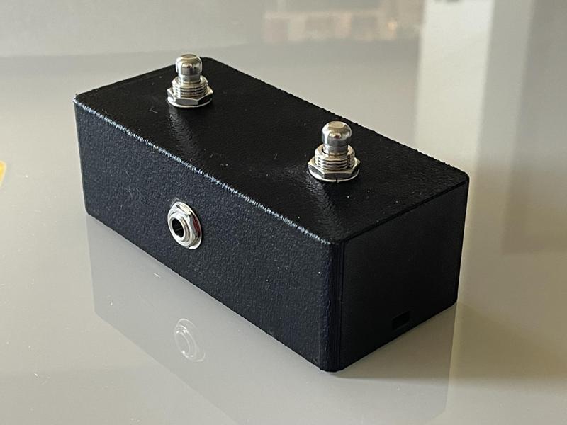 Guitar pedal footswitch snap-fit enclosure