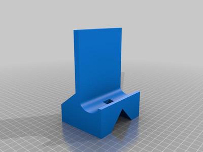 Phone stand with charger hole
