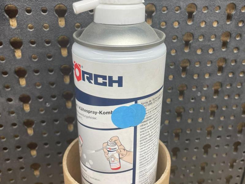 Cardboard spool holder for pegboard