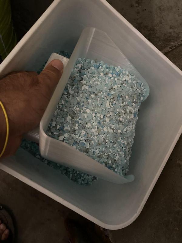 Scoop for spreading de-icing salt on your driveway