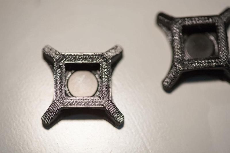 Magnetic base to hold 13mm cable straps for cord management