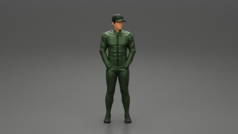 motorbiker standing with his hands in pocket