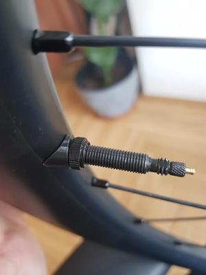 Asymmetrical Valve Washer