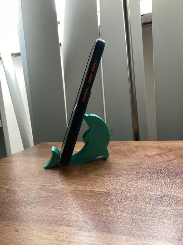 Dolphin-shaped cell phone holder or holder