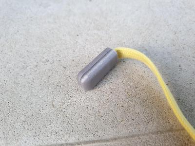 Snap fit aglet cover