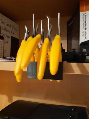 Plier hanger for 25mm wood shelving