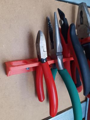 Holder for pliers