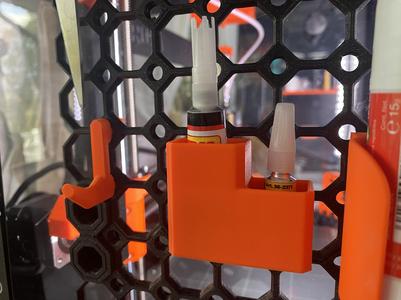 Multiboard super glue tube holder