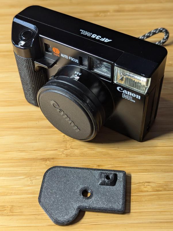 Canon-AF35-ML battery plate