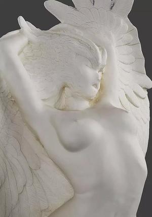 Winged nude female sculpture