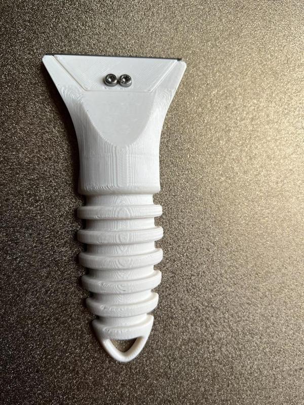 Scraper use stanley blade