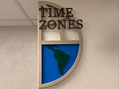 Decorative wall panel with time zones