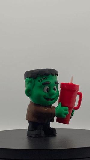 Frankenstein holding tumbler