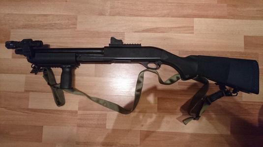 Airsoft shotgun (CM350) flashlight mount