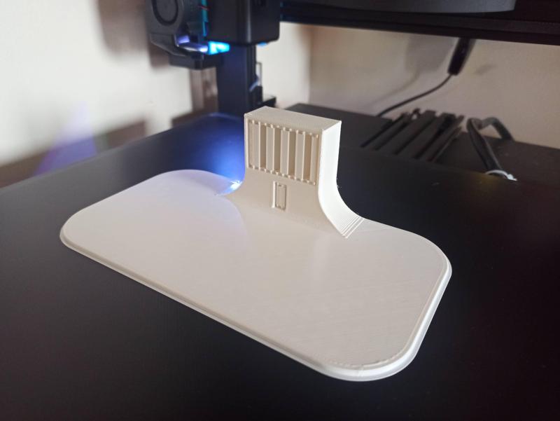 Phone holder on socket