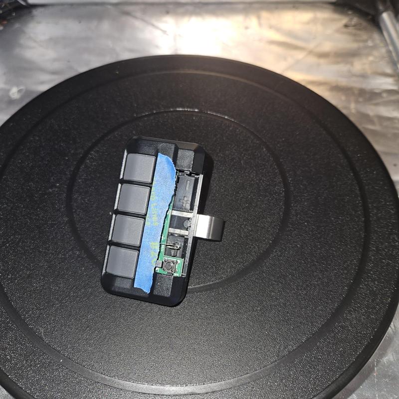 Battery cover for 4 button garage door remote