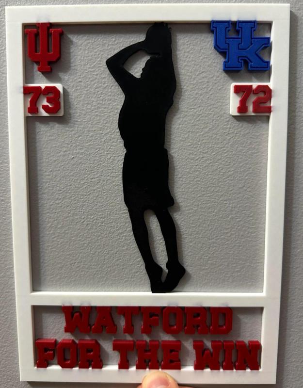 "The Wat Shot" wall sign