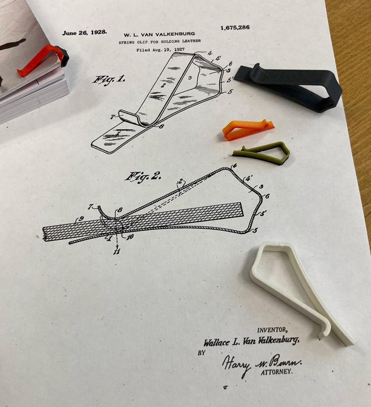 Spring clip for holding leather