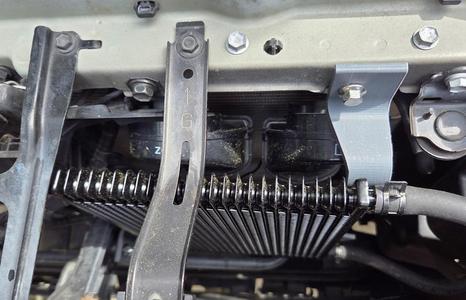 Brackets to mount Hayden 678 transmission cooler in GX460