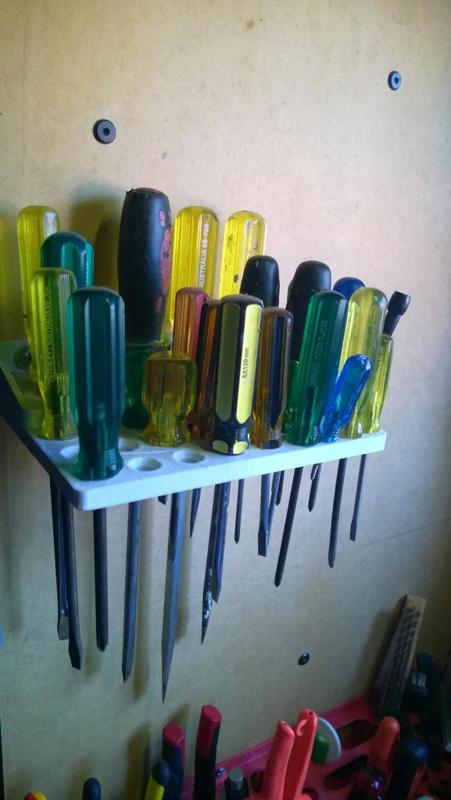 Wall holder for screwdrivers in the workshop