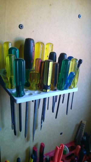Wall holder for screwdrivers in the workshop
