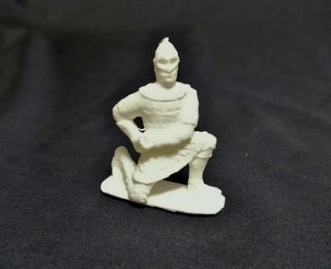 A seated army soldier