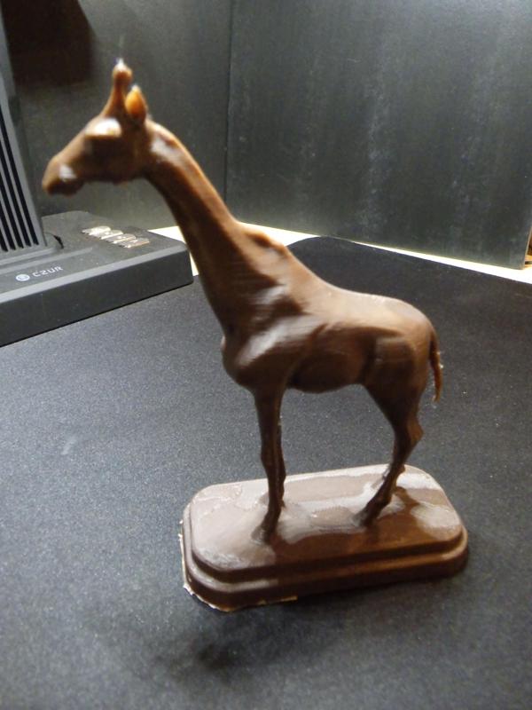 Giraffe Sculpture on a pedestal