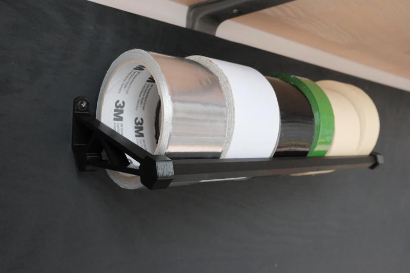 Wall-mounted tape holder