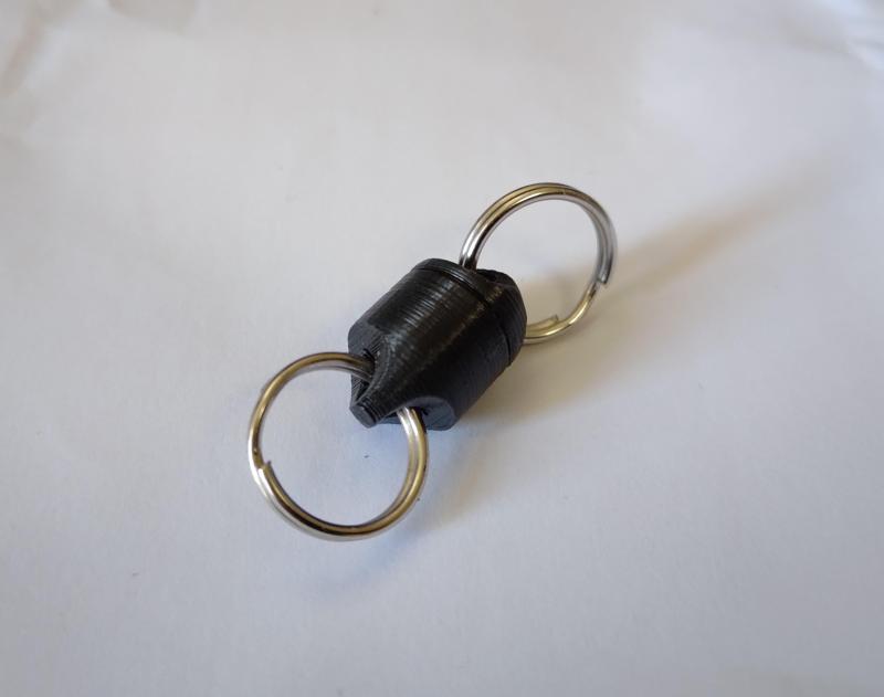 Parametric magnetic quick release keychain